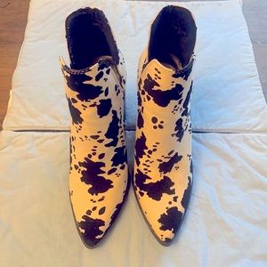 She and in cow print booties( shoes) size 7